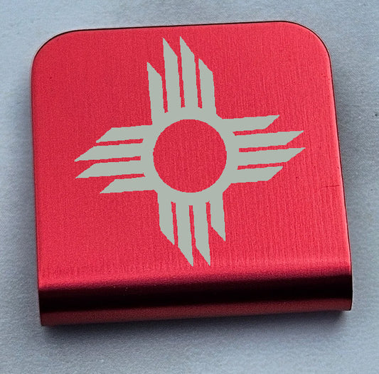 Cap Clip Featuring an altered Logo of the Zia symbol in the New Mexico Flag